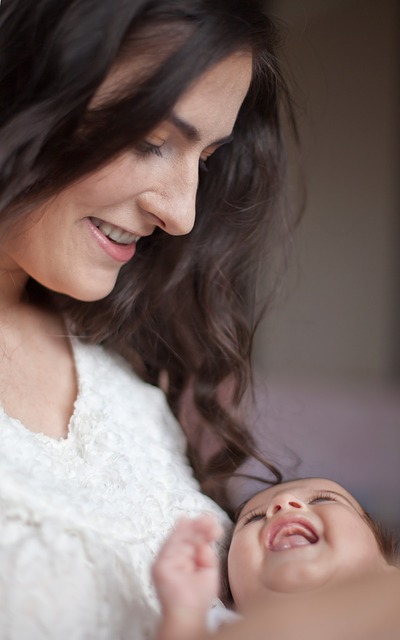 Baby and Mother Smiling