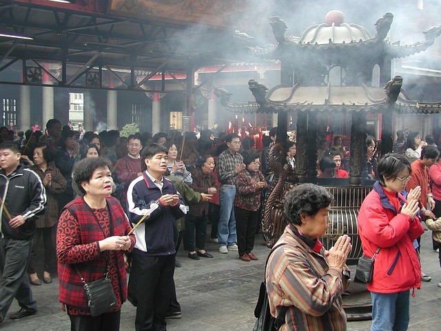 Chinese In Prayer
