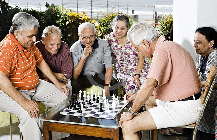 Happy Elderly Playing Chess