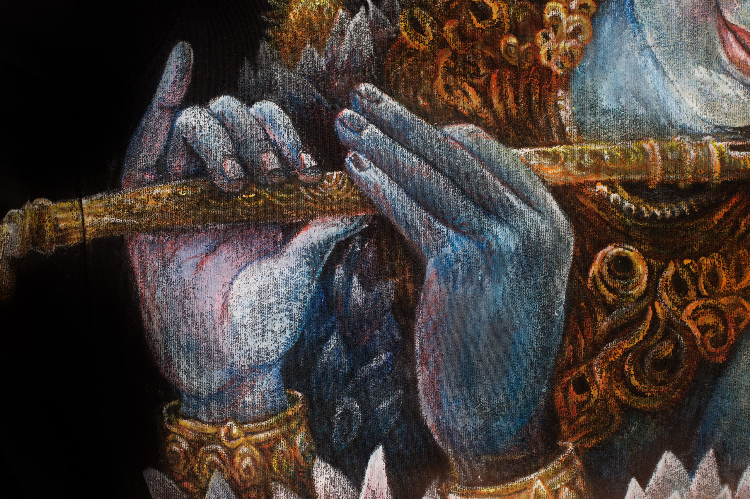 hands of lord krishna playing flute, detail with lotus pattern
