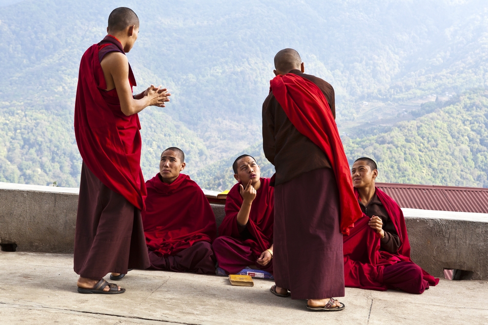MONKS DISCUSSING IN  NALANDA BHUDDIST COLLEGE – PUNAKHA – BHUTAN