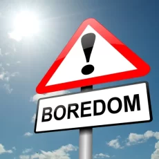 Why does one feel bored in the office?